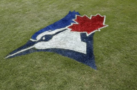 DUNEDIN, FL – FEBRUARY 24: General view of the Toronto Blue Jays logo painted in the grass prior to a Grapefruit League spring training game against the Atlanta Braves at TD Ballpark on February 24, 2020 in Dunedin, Florida. (Photo by Joe Robbins/Getty Images)