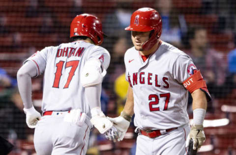 BOSTON, MA – MAY 14: Shohei Ohtani #17 of the Los Angeles Angels reacts with Mike Trout #27 after hitting a solo home run during the sixth inning of a game against the Boston Red Sox on May 14, 2021 at Fenway Park in Boston, Massachusetts. (Photo by Billie Weiss/Boston Red Sox/Getty Images)