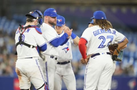 TORONTO, ON – JULY 14: Toronto Blue Jays manager John Schneider stands on the mound during a pitching change against the Kansas City Royals in the eighth inning during their MLB game at the Rogers Centre on July 14, 2022 in Toronto, Ontario, Canada. (Photo by Mark Blinch/Getty Images)