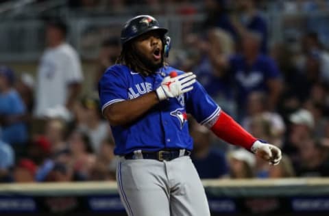 MINNEAPOLIS, MN – AUGUST 05: Vladimir Guerrero Jr. #27 of the Toronto Blue Jays celebrates his two-run home run against the Minnesota Twins in the sixth inning of the game at Target Field on August 5, 2022 in Minneapolis, Minnesota. The Twins defeated the Blue Jays 6-5 in ten innings. (Photo by David Berding/Getty Images)