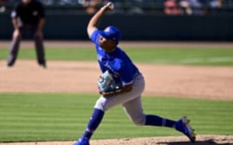 LAKELAND, FLORIDA – MARCH 04: Elvis Luciano #65 of the Toronto Blue Jays throws a pitch during the fifth inning against the Detroit Tigers during a spring training game at Publix Field at Joker Marchant Stadium on March 04, 2021 in Lakeland, Florida. (Photo by Douglas P. DeFelice/Getty Images)