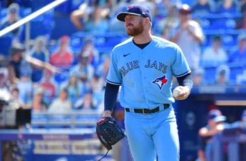 DUNEDIN, FLORIDA – MAY 23: Travis Bergen #64 of the Toronto Blue Jays reacts after walking in a third run in the ninth inning against the Tampa Bay Rays at TD Ballpark on May 23, 2021 in Dunedin, Florida. (Photo by Julio Aguilar/Getty Images)