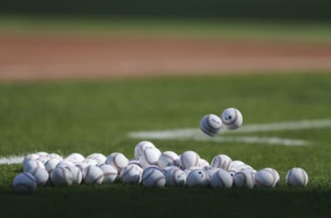 BUFFALO, NEW YORK – JUNE 29: Baseballs in a pile on the field before the game between the Toronto Blue Jays and Seattle Mariners at Sahlen Field on June 29, 2021 in Buffalo, New York. (Photo by Joshua Bessex/Getty Images)