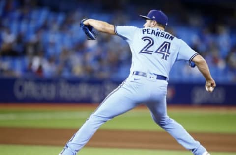 TORONTO, ON – SEPTEMBER 03: Nate Pearson #24 of the Toronto Blue Jays delivers a pitch during a MLB game against the Oakland Athletics at Rogers Centre on September 3, 2021 in Toronto, Ontario, Canada. (Photo by Vaughn Ridley/Getty Images)