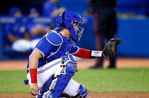 TORONTO, ON – SEPTEMBER 14: Reese McGuire #7 of the Toronto Blue Jays catches during a MLB game against the Tampa Bay Rays at Rogers Centre on September 14, 2021 in Toronto, Ontario, Canada. (Photo by Vaughn Ridley/Getty Images)