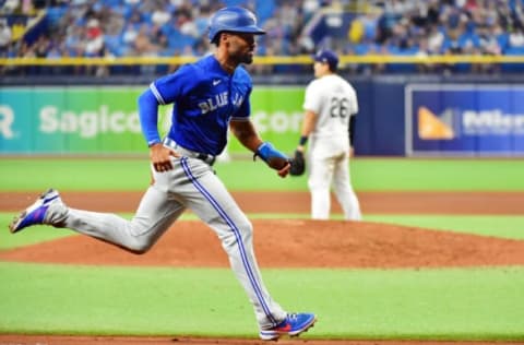 ST PETERSBURG, FLORIDA – SEPTEMBER 21: Marcus Semien #10 of the Toronto Blue Jays runs home after Bo Bichette hit a sacrifice fly in the sixth inning against the Tampa Bay Rays at Tropicana Field on September 21, 2021 in St Petersburg, Florida. (Photo by Julio Aguilar/Getty Images)