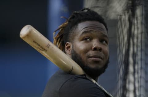 TORONTO, ON – SEPTEMBER 17: Vladimir Guerrero Jr. #27 of the Toronto Blue Jays warms up prior to their MLB game against the Minnesota Twins at Rogers Centre on September 17, 2021 in Toronto, Ontario. (Photo by Cole Burston/Getty Images)