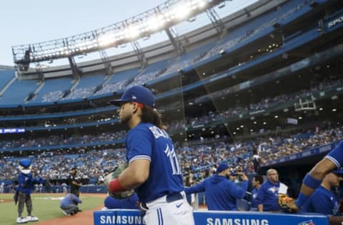 TORONTO, ON – SEPTEMBER 17: Bo Bichette #11 of the Toronto Blue Jays takes the field at the start of their MLB game against the Minnesota Twins at Rogers Centre on September 17, 2021 in Toronto, Ontario. (Photo by Cole Burston/Getty Images)