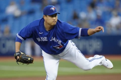 TORONTO, ON – SEPTEMBER 17: Hyun Jin Ryu #99 of the Toronto Blue Jays pitches in the first inning of their MLB game against the Minnesota Twins at Rogers Centre on September 17, 2021 in Toronto, Ontario. (Photo by Cole Burston/Getty Images)