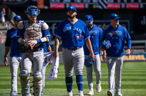 MINNEAPOLIS, MN – SEPTEMBER 26: Starting pitcher Alek Manoah #6 of the Toronto Blue Jays and catcher Danny Jansen #9 head to the dugout before the game against the Minnesota Twins at Target Field on September 26, 2021 in Minneapolis, Minnesota. (Photo by Stephen Maturen/Getty Images)