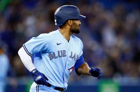 TORONTO, ON – SEPTEMBER 29: Marcus Semien #10 of the Toronto Blue Jays hits a 2-run home run in the first inning during a MLB game against the New York Yankees at Rogers Centre on September 29, 2021 in Toronto, Ontario, Canada. (Photo by Vaughn Ridley/Getty Images)