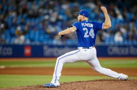 TORONTO, ON – SEPTEMBER 30: Nate Pearson #24 of the Toronto Blue Jays pitches in the eighth inning of their MLB game against the New York Yankees at Rogers Centre on September 30, 2021 in Toronto, Ontario. (Photo by Cole Burston/Getty Images)