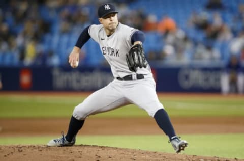 TORONTO, ON – SEPTEMBER 30: Corey Kluber #28 of the New York Yankees pitches in the first inning of their MLB game against the Toronto Blue Jays at Rogers Centre on September 30, 2021 in Toronto, Ontario. (Photo by Cole Burston/Getty Images)