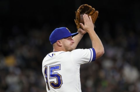 SEATTLE, WASHINGTON – OCTOBER 03: Kyle Seager #15 of the Seattle Mariners reacts as he was pulled from the game during the ninth inning against the Los Angeles Angels at T-Mobile Park on October 03, 2021 in Seattle, Washington. (Photo by Steph Chambers/Getty Images)