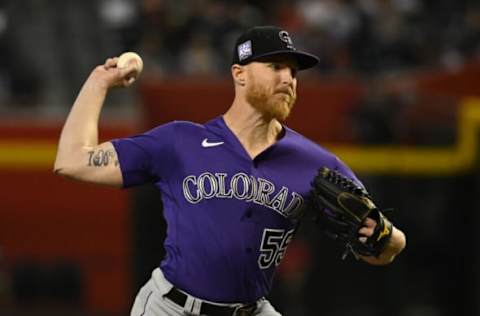 PHOENIX, ARIZONA – OCTOBER 01: Jon Gray #55 of the Colorado Rockies delivers a pitch against the Arizona Diamondbacks at Chase Field on October 01, 2021 in Phoenix, Arizona. (Photo by Norm Hall/Getty Images)