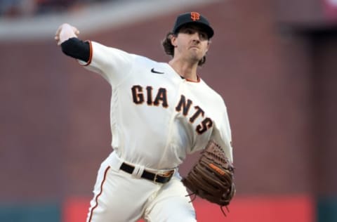 SAN FRANCISCO, CALIFORNIA – OCTOBER 09: Kevin Gausman #34 of the San Francisco Giants pitches in the first inning against the Los Angeles Dodgers during Game 2 of the National League Division Series at Oracle Park on October 09, 2021 in San Francisco, California. (Photo by Harry How/Getty Images)