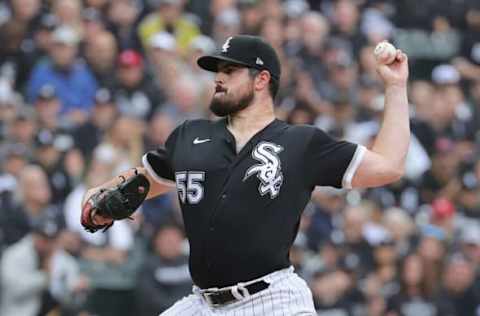 CHICAGO, ILLINOIS – OCTOBER 12: Starting pitcher Carlos Rodon #55 of the Chicago White Sox delivers the ball against the Houston Astros at Guaranteed Rate Field on October 12, 2021 in Chicago, Illinois. The Astros defeated the White Sox 10-1. (Photo by Jonathan Daniel/Getty Images)