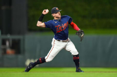 MINNEAPOLIS, MN – SEPTEMBER 28: Josh Donaldson #20 of the Minnesota Twins throws against the Detroit Tigers on September 28, 2021 at Target Field in Minneapolis, Minnesota. (Photo by Brace Hemmelgarn/Minnesota Twins/Getty Images)