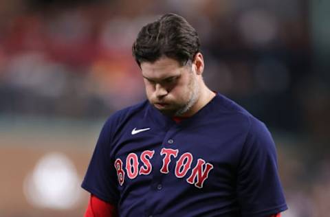 HOUSTON, TEXAS – OCTOBER 22: Adam Ottavino #0 of the Boston Red Sox reacts against the Houston Astros during the eighth inning in Game Six of the American League Championship Series at Minute Maid Park on October 22, 2021 in Houston, Texas. (Photo by Carmen Mandato/Getty Images)