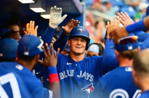 DUNEDIN, FLORIDA – APRIL 02: Matt Chapman #26 of the Toronto Blue Jays celebrates with teammates after hitting a home run in the fifth inning against the Philadelphia Phillies during a Grapefruit League spring training game at TD Ballpark on April 02, 2022 in Dunedin, Florida. (Photo by Julio Aguilar/Getty Images)