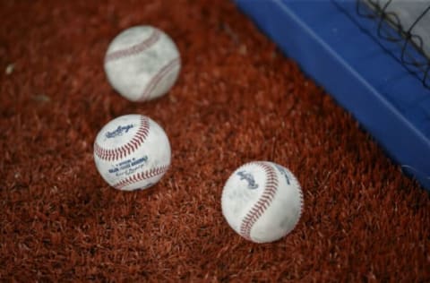 TORONTO, ON – MAY 03: Rawling baseballs are seen on the turf ahead of the MLB game between the Toronto Blue Jays and the New York Yankees at Rogers Centre on May 3, 2022 in Toronto, Canada. (Photo by Cole Burston/Getty Images)