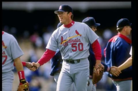 14 May 1995: Pitcher Tom Henke of the St. Louis Cardinals gets congratulations for saving a game against the Los Angeles Dodgers at Dodger Stadium in Los Angeles, California. The Cardinals won the game 6-5.