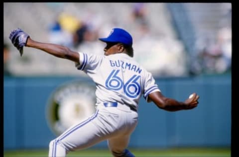 1 Sep 1993: Pitcher Juan Guzman of the Toronto Blue Jays throws a pitch during a game against the Oakland Athletics at the Oakland Coliseum in Oakland, California. Mandatory Credit: Otto Greule /Allsport