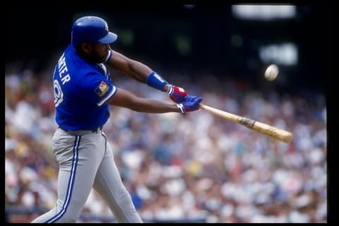 17 Apr 1994: First baseman Joe Carter of the Toronto Blue Jays swings at the ball during a game against the California Angels at Anaheim Stadium in Anaheim, California. Mandatory Credit: Stephen Dunn /Allsport