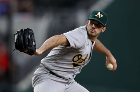 ARLINGTON, TEXAS – AUGUST 18: Zach Logue #67 of the Oakland Athletics pitches against the Texas Rangers in the bottom of the first inning at Globe Life Field on August 18, 2022 in Arlington, Texas. (Photo by Tom Pennington/Getty Images)