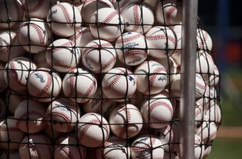 TORONTO, ON – AUGUST 27: Rawlings baseballs behind netting ahead of the MLB game between the Toronto Blue Jays and the Los Angeles Angels at Rogers Centre on August 27, 2022 in Toronto, Canada. (Photo by Cole Burston/Getty Images)