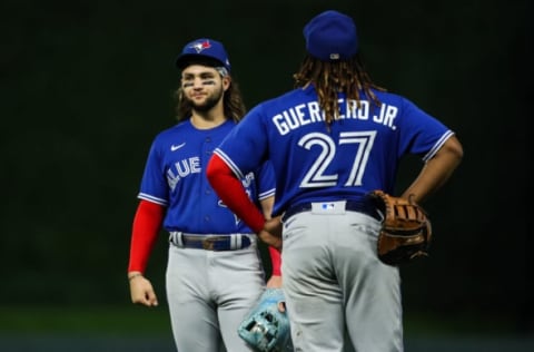 MINNEAPOLIS, MN – AUGUST 06: Bo Bichette #11 and Vladimir Guerrero Jr. #27 of the Toronto Blue Jays look on against the Minnesota Twins in the sixth inning of the game at Target Field on August 6, 2022 in Minneapolis, Minnesota. The Twins defeated the Blue Jays 7-3. (Photo by David Berding/Getty Images)