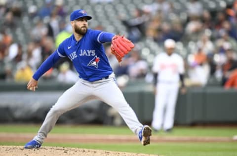 BALTIMORE, MARYLAND – OCTOBER 05: Anthony Bass #52 of the Toronto Blue Jays pitches against the Baltimore Orioles during game two of a doubleheader at Oriole Park at Camden Yards on October 05, 2022 in Baltimore, Maryland. (Photo by G Fiume/Getty Images)