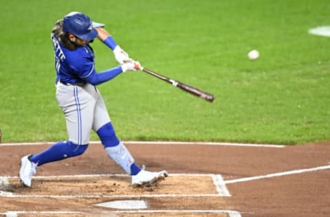 BALTIMORE, MARYLAND – OCTOBER 03: Bo Bichette #11 of the Toronto Blue Jays bats against the Baltimore Orioles at Oriole Park at Camden Yards on October 03, 2022 in Baltimore, Maryland. (Photo by G Fiume/Getty Images)