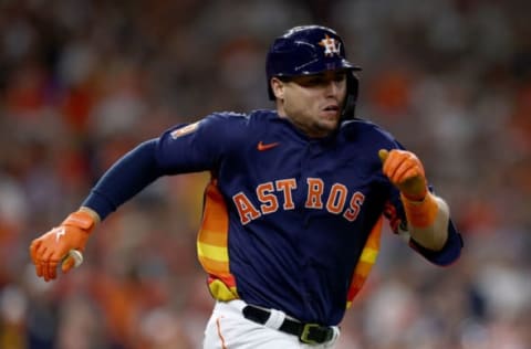 HOUSTON, TEXAS – OCTOBER 20: Aledmys Diaz #16 of the Houston Astros hits into a double play against the New York Yankees during the sixth inning in game two of the American League Championship Series at Minute Maid Park on October 20, 2022 in Houston, Texas. (Photo by Tom Pennington/Getty Images)