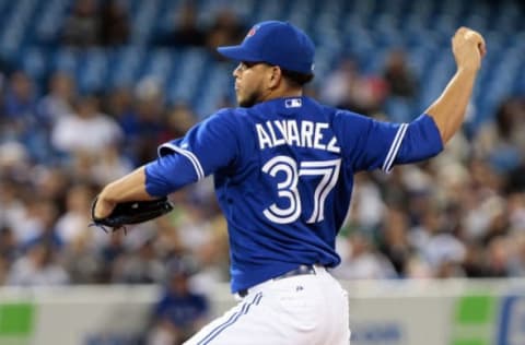 TORONTO, CANADA – SEPTEMBER 30: Henderson Alvarez #37 of the Toronto Blue Jays throws a pitch against the New York Yankees during MLB action at the Rogers Centre September 30, 2012 in Toronto, Ontario, Canada. (Photo by Abelimages/Getty Images)