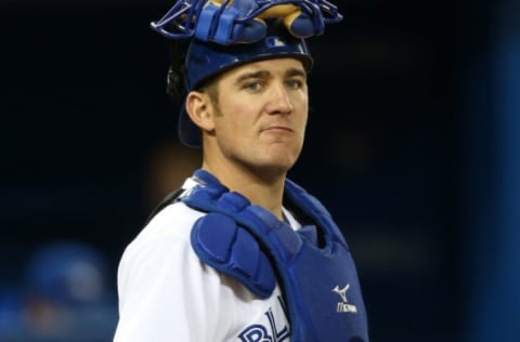 TORONTO, CANADA – OCTOBER 1: Jeff Mathis #6 of the Toronto Blue Jays during MLB game action against the Minnesota Twins on October 1, 2012 at Rogers Centre in Toronto, Ontario, Canada. (Photo by Tom Szczerbowski/Getty Images)