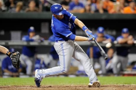 BALTIMORE, MD – SEPTEMBER 26: J.P. Arencibia #9 of the Toronto Blue Jays hits a double in the seventh inning against the Baltimore Orioles at Oriole Park at Camden Yards on September 26, 2013 in Baltimore, Maryland. (Photo by Greg Fiume/Getty Images)