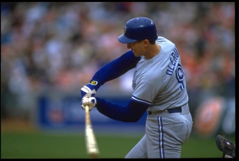 30 May 1993: JOHN OLERUD, FIRST BASEMAN FOR THE TORONTO BLUE JAYS, SWINGS AT A PITCH DURING THEIR GAME AGAINST THE OAKLAND A”S AT THE OAKLAND COLISEUM IN OAKLAND, CALIFORNIA.