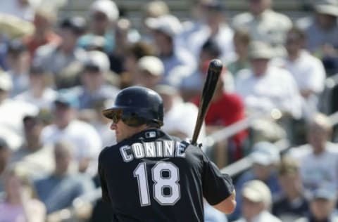 JUPITER, FL – MARCH 11: Jeff Conine #18 of the Florida Marlins bats against the Minnesota Twins during their game on March 11, 2004 at Roger Dean Stadium in Jupiter, Florida. The Marlins won 5-4. (Photo by Ezra Shaw/Getty Images)