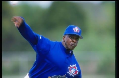 23 Feb 1997: Pitcher Juan Guzman of the Toronto Blue Jays looks on during spring training in Dunedin, Florida. Mandatory Credit: Andy Lyons /Allsport