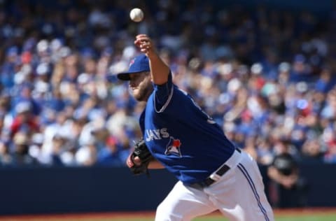 TORONTO, CANADA – SEPTEMBER 27: Mark Buehrle #56 of the Toronto Blue Jays delivers a pitch in the first inning during MLB game action against the Tampa Bay Rays on September 27, 2015 at Rogers Centre in Toronto, Ontario, Canada. (Photo by Tom Szczerbowski/Getty Images)