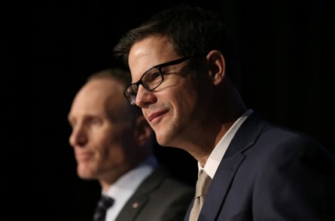 TORONTO, CANADA – DECEMBER 4: President Mark Shapiro looks on as Ross Atkins speaks to the media as Atkins is introduced as the new general manager of the Toronto Blue Jays during a press conference on December 4, 2015 at Rogers Centre in Toronto, Ontario, Canada. (Photo by Tom Szczerbowski/Getty Images)