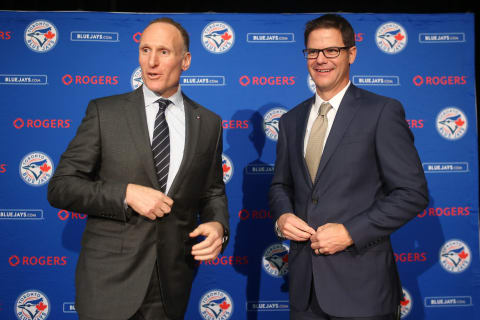 TORONTO, CANADA – DECEMBER 4: President Mark Shapiro and Ross Atkins pose for a photo after speaking to the media as Atkins is introduced as the new general manager of the Toronto Blue Jays during a press conference on December 4, 2015 at Rogers Centre in Toronto, Ontario, Canada. (Photo by Tom Szczerbowski/Getty Images)