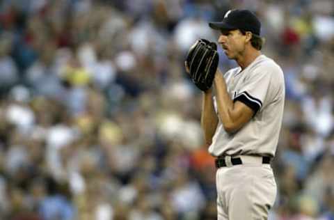 SEATTLE – AUGUST 31: Pitcher Randy Johnson #41 of the New York Yankees prepares to pitch against the Seattle Mariners on August 31, 2005 at Safeco Field in Seattle Washington. The Yankees won 2-0. (Photo by Otto Greule Jr/Getty Images)