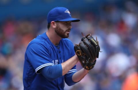 TORONTO, CANADA – JULY 2: Drew Hutchison #36 of the Toronto Blue Jays looks in before delivering a pitch in the seventh inning during MLB game action against the Cleveland Indians on July 2, 2016 at Rogers Centre in Toronto, Ontario, Canada. (Photo by Tom Szczerbowski/Getty Images)