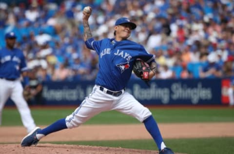 TORONTO, CANADA – JULY 30: Jesse Chavez #30 of the Toronto Blue Jays delivers a pitch in the ninth inning during MLB game action against the Baltimore Orioles on July 30, 2016 at Rogers Centre in Toronto, Ontario, Canada. (Photo by Tom Szczerbowski/Getty Images)