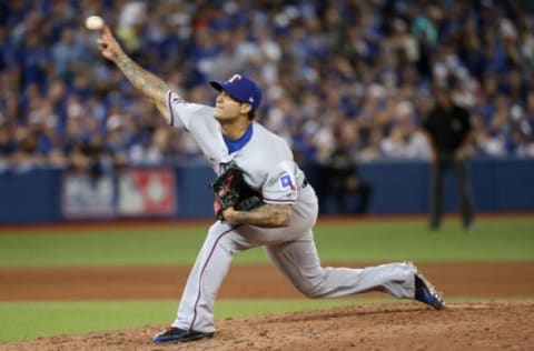 TORONTO, ON – OCTOBER 9: Matt Bush #51 of the Texas Rangers works against the Toronto Blue Jays in the eighth inning during game three of the American League Division Series at Rogers Centre on October 9, 2016 in Toronto, Canada. (Photo by Tom Szczerbowski/Getty Images)