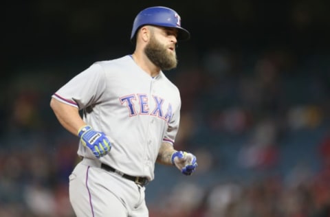 ANAHEIM, CALIFORNIA – APRIL 12: Mike Napoli #5 of the Texas Rangers rounds the bases after hitting a solo home run in the second inning against the Los Angeles Angels of Anaheim at Angel Stadium of Anaheim on April 12, 2017 in Anaheim, California. (Photo by Stephen Dunn/Getty Images)