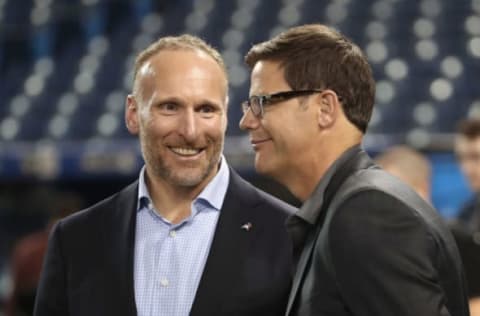 TORONTO, ON – APRIL 11: President and CEO Mark Shapiro of the Toronto Blue Jays talks to general manager Ross Atkins before the start of their home opener against the Milwaukee Brewers at Rogers Centre on April 11, 2017 in Toronto, Canada. (Photo by Tom Szczerbowski/Getty Images)