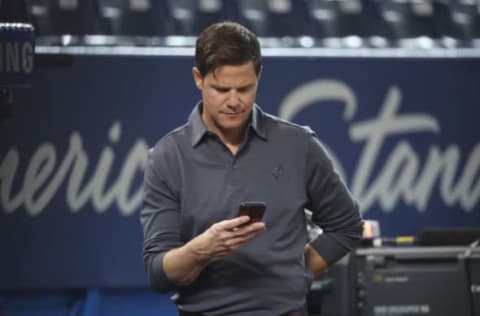 TORONTO, ON – APRIL 14: General manager Ross Atkins of the Toronto Blue Jays on his cell phone during batting practice before the start of MLB game action against the Baltimore Orioles at Rogers Centre on April 14, 2017 in Toronto, Canada. (Photo by Tom Szczerbowski/Getty Images)